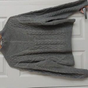 A Lucky Brand gray zippered(1/3 of sweater front). Size L